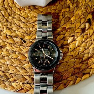 Two tone MK fashion watch. Normal wear.